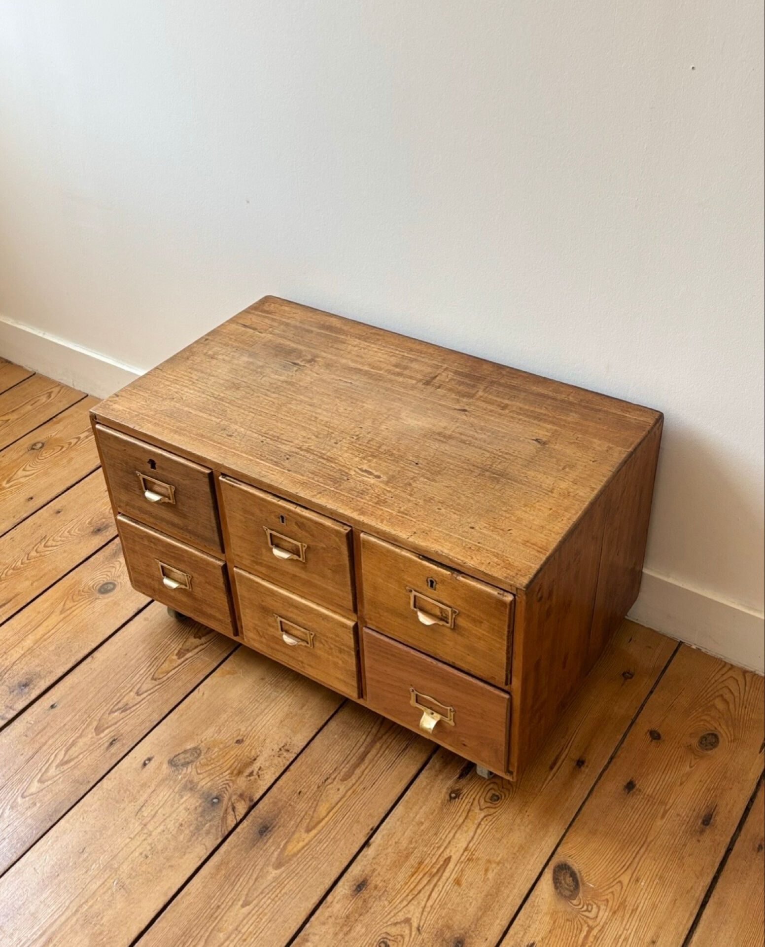 Small antique work cabinet with 6 drawers.