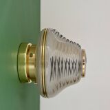 Vintage Art Deco globe wall/ceiling light in white, black, and gold glass.