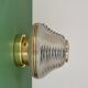 Vintage Art Deco globe wall/ceiling light in white, black, and gold glass.