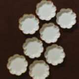Set of eight small bread plates in white Limoges porcelain