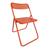 Perforated metal folding chair