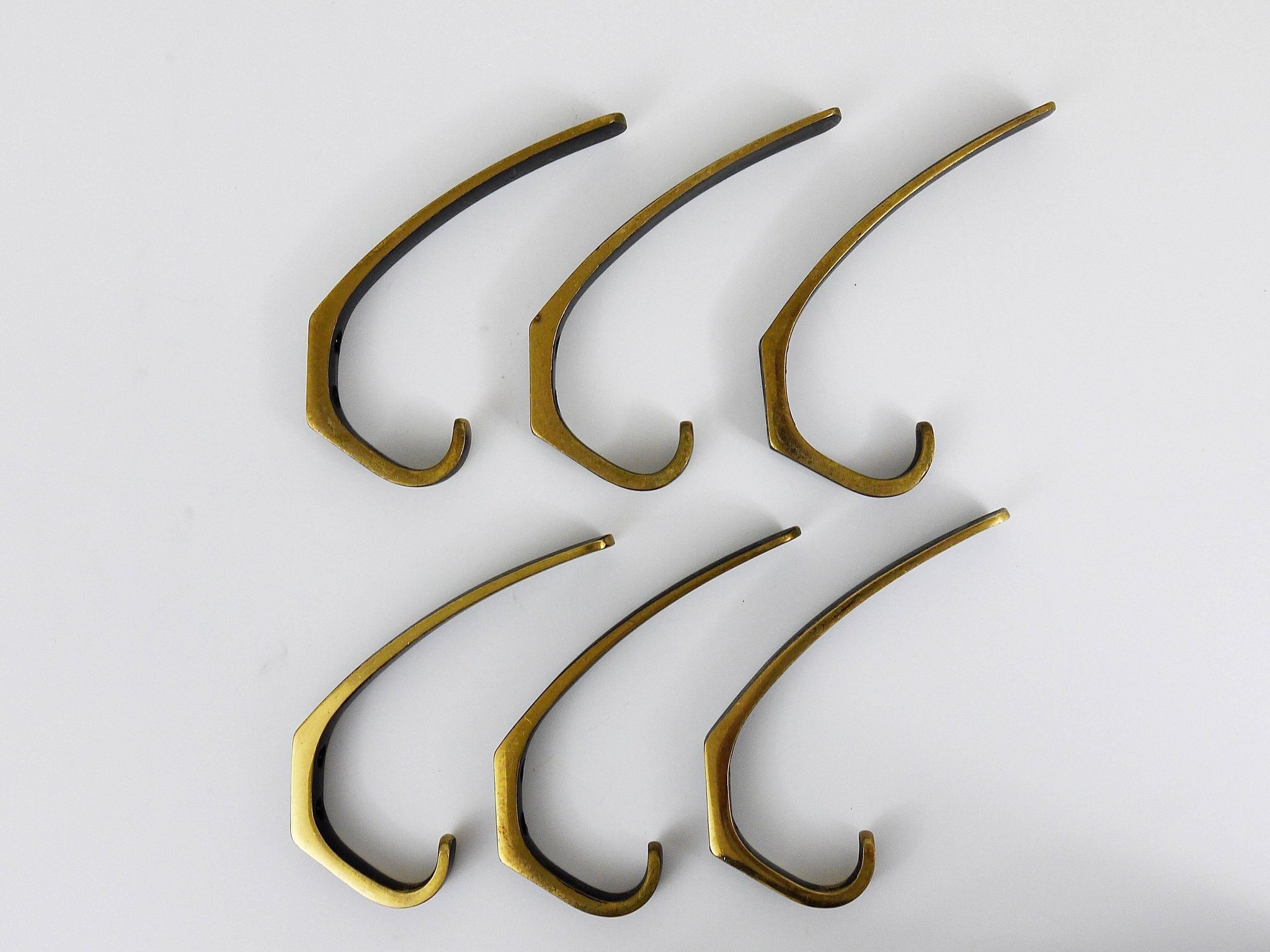 Up to 2 mid-century brass wall hooks by Hertha Baller, Austria, 1950s.