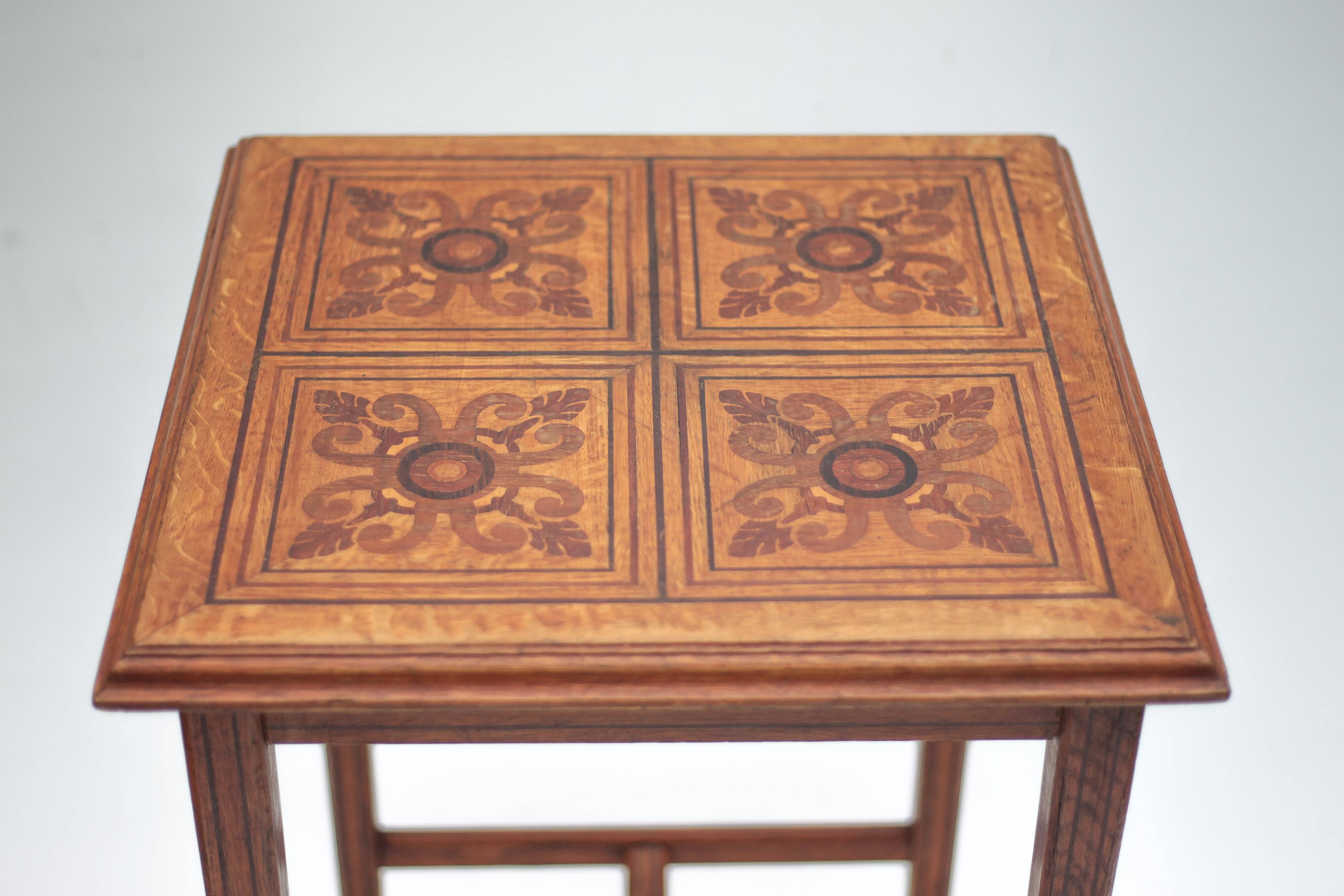 Wood table with marquetry, table with an antique parquet top, antique table.