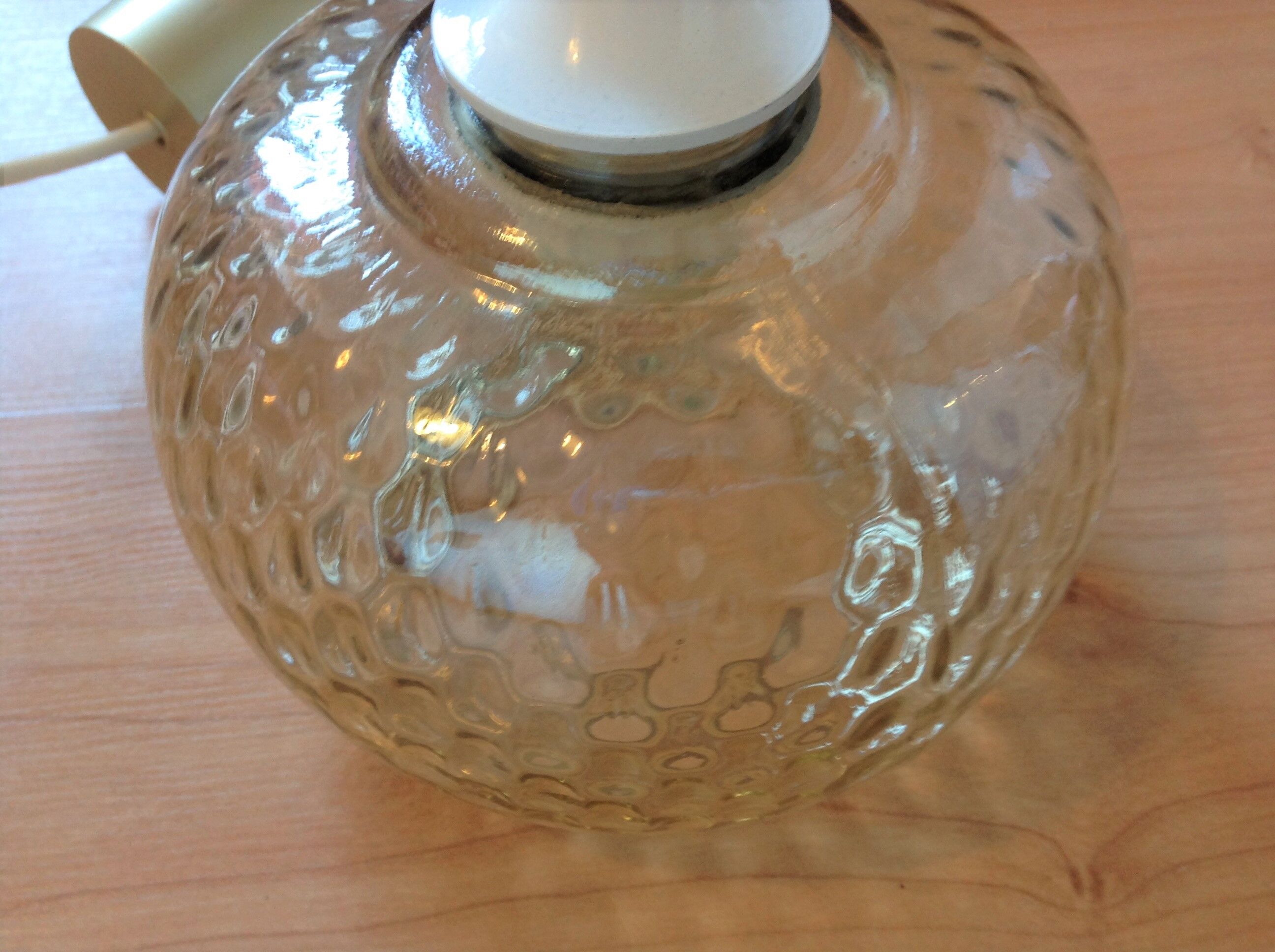 Globe pendant lamp in bubbled amber glass / vintage 60s-70s