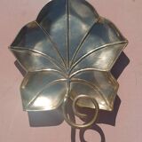 Gilded brass leaf pocket emptier