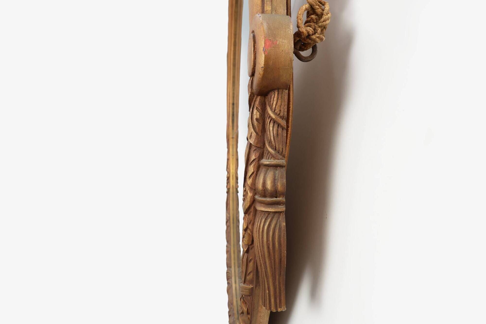 French oval gilded oak  carved art deco mirror, ca. 1925