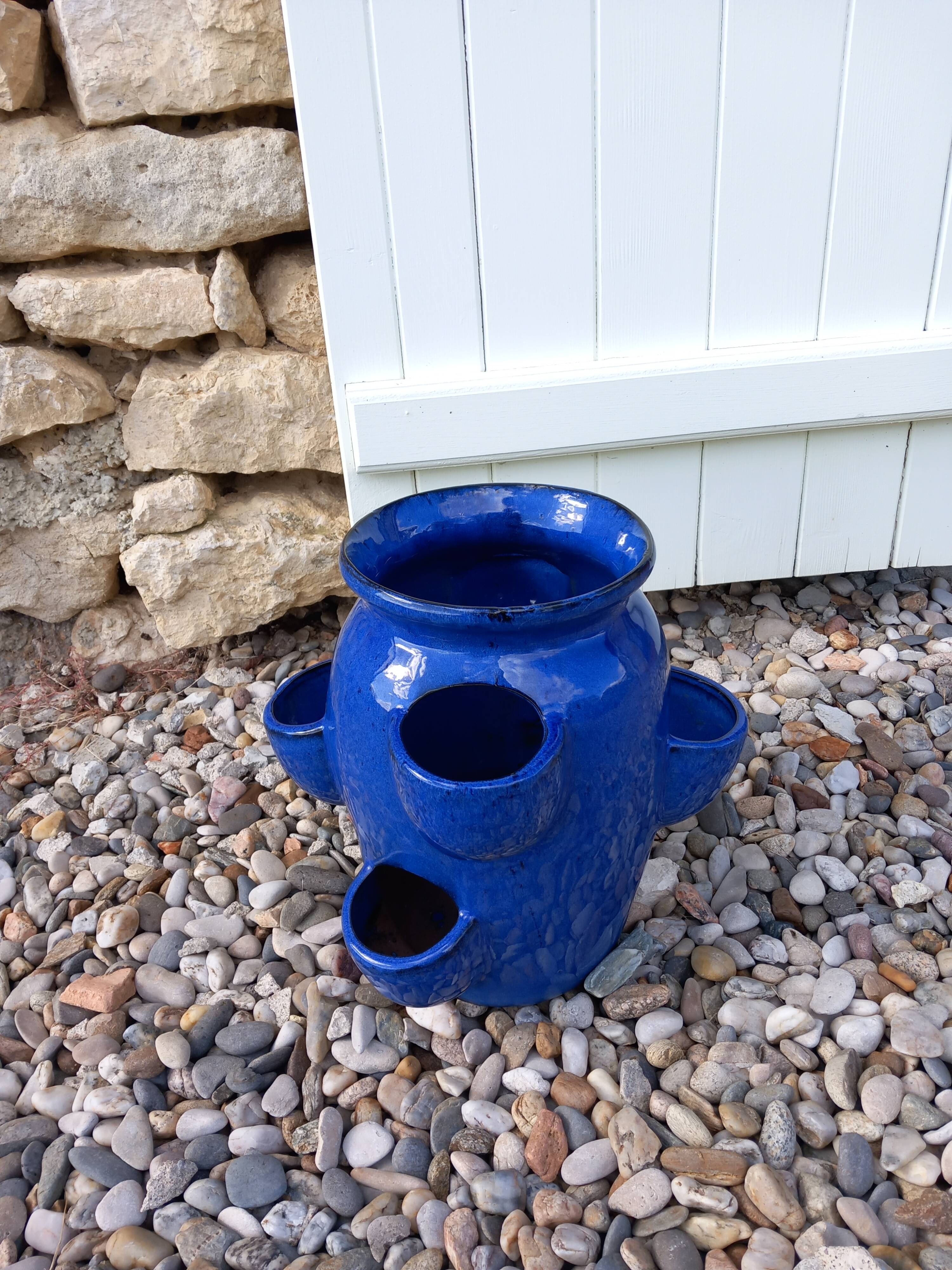 Blue glazed terracotta strawberry pot