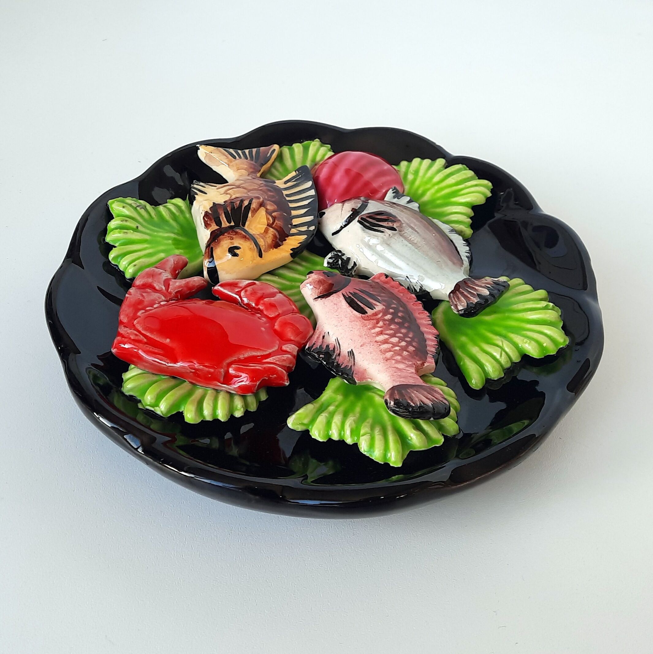 Flat wall plate ceramic Vallauris. Fish, crab, shellfish