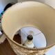 Antique table lamp in marble and tapestry
