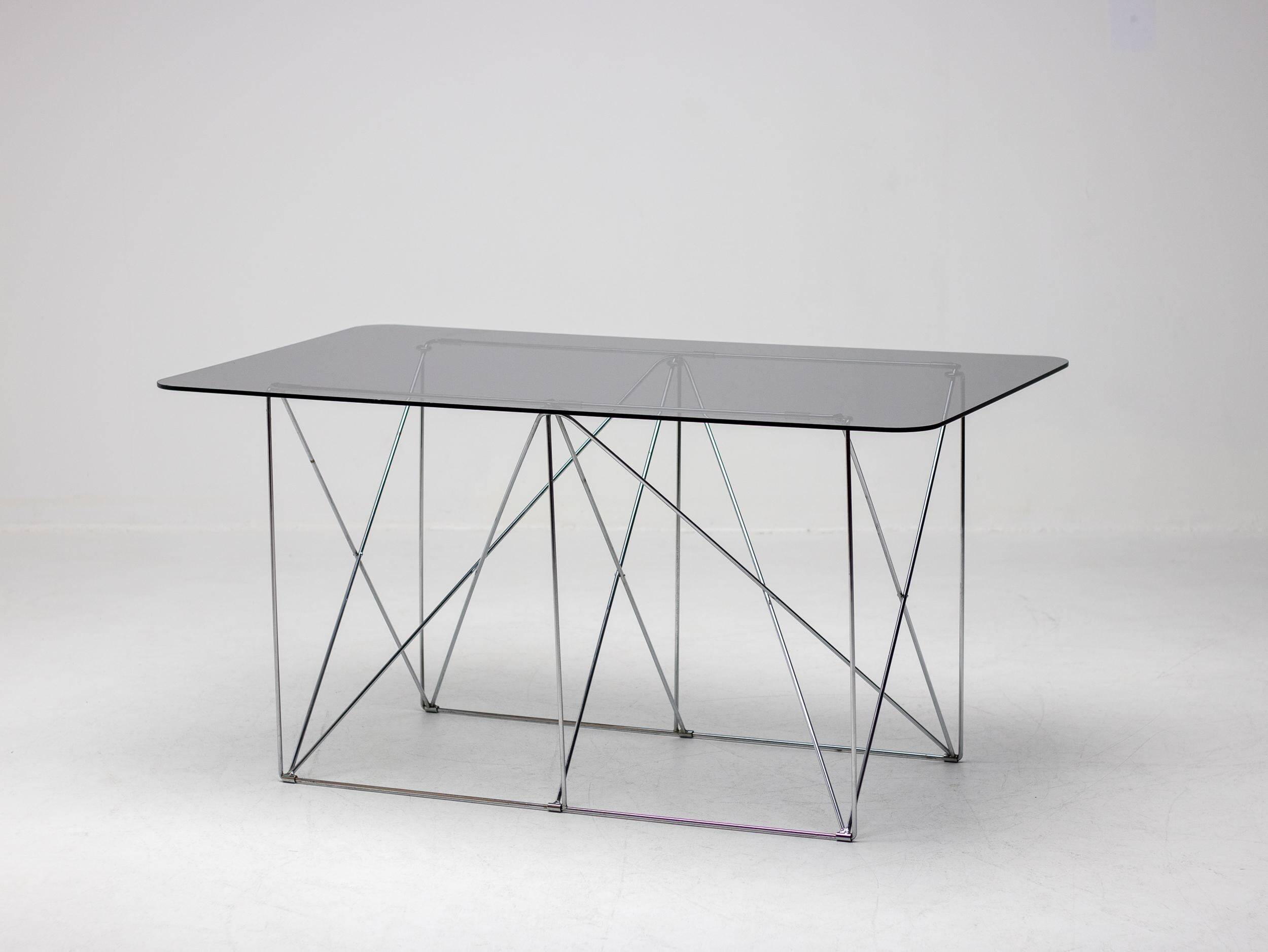 Table de salle à manger pliante en verre fumé Max Sauze - Un chef-d'œuvre de design minimaliste