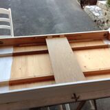White farmhouse table set and four chairs