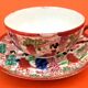Antique tea cup and saucer with Japonisme decoration.