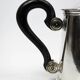 Christofle teapot in silver-plated metal, with a blackened wood handle — late 19th century, early 20th century.