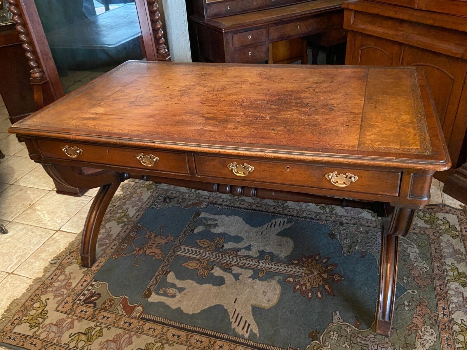 English mahogany desk early twentieth opening to two drawers