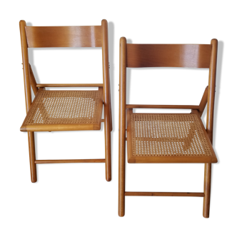 2 folding chairs in cannage