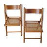 2 folding chairs in cannage