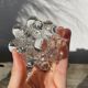 Trio of small, clear glass candle holders