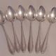Silver metal cutlery set consisting of 6 soup spoons and 6 small spoons