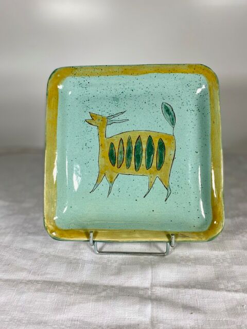 Small handmade glazed clay dish