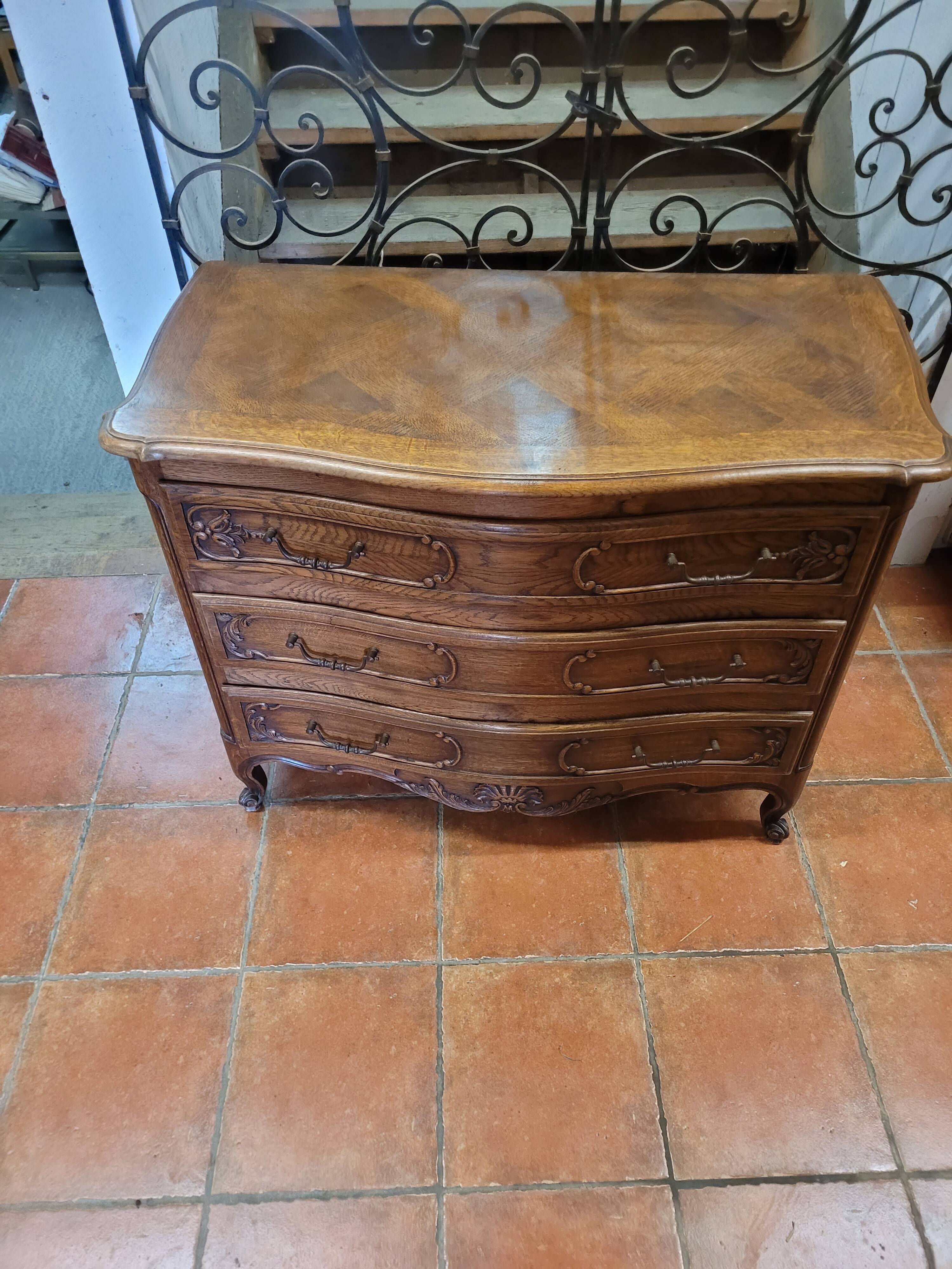 Curved oak chest of drawers in Louis XV style