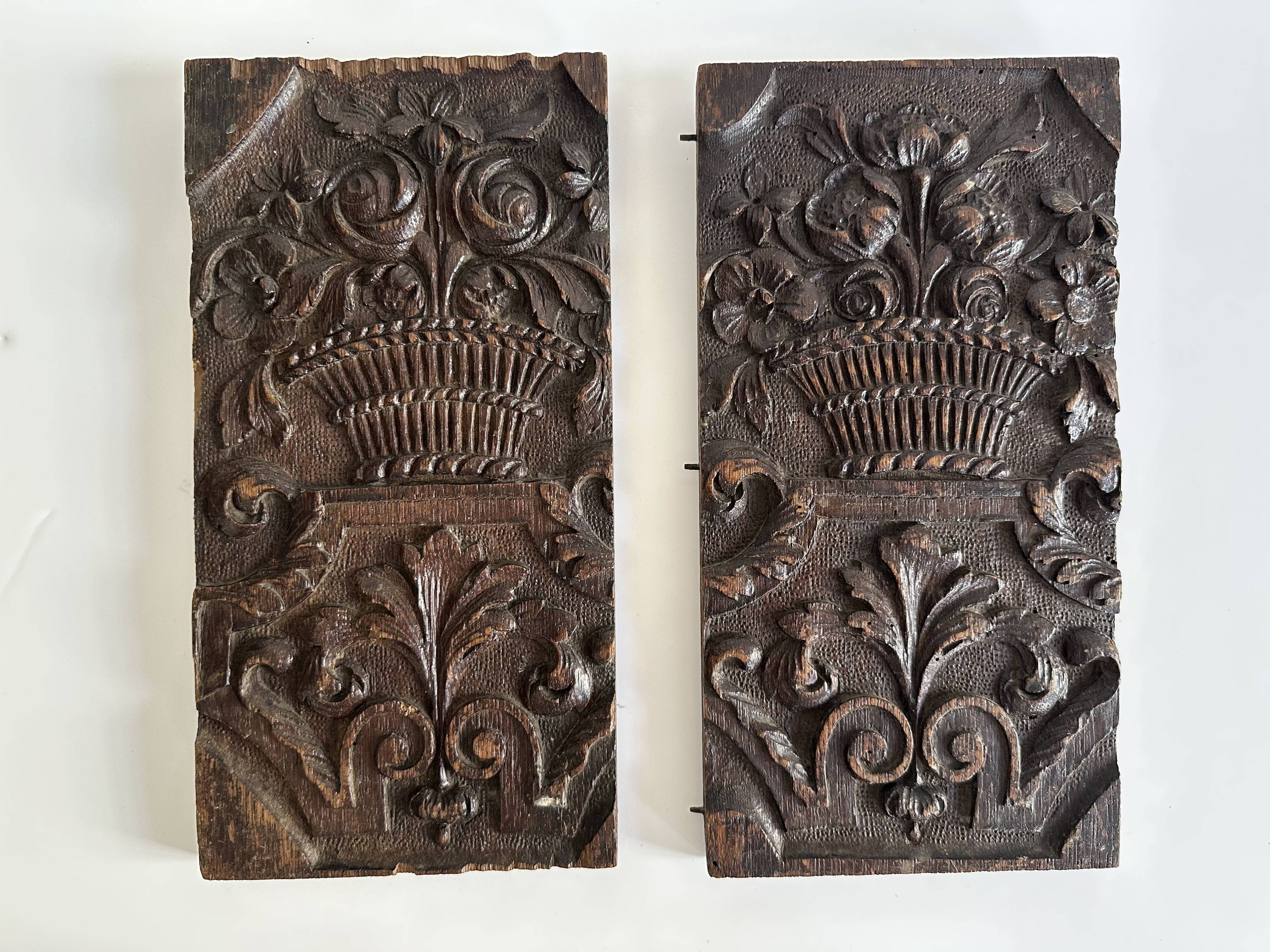 Pair of antique decorative panels in carved wood, 19th century