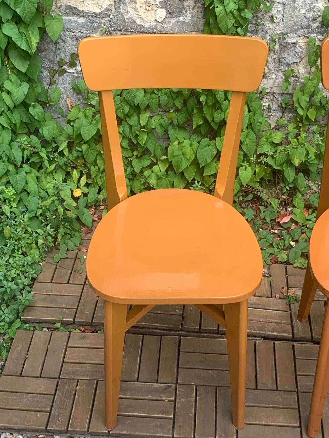 Pair of caramel bistro chairs 1950