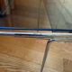 Nest of coffee tables in glass and metal.