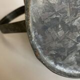 Old garden pitcher vase in folded zinc
