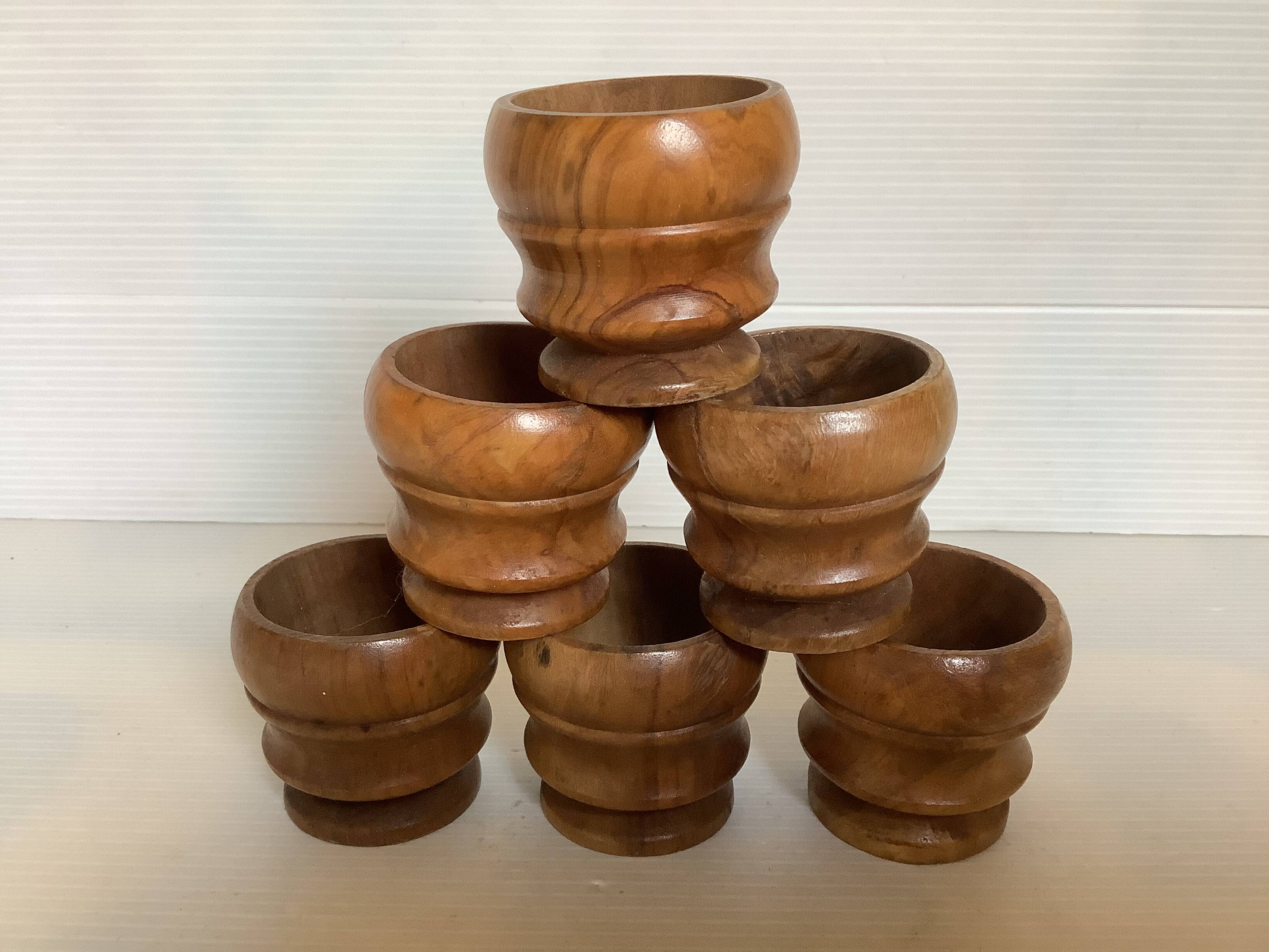 Six olive wood egg cups