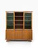 Vintage wooden display cabinet with green glass.