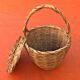 Antique snail basket with woven wicker lid