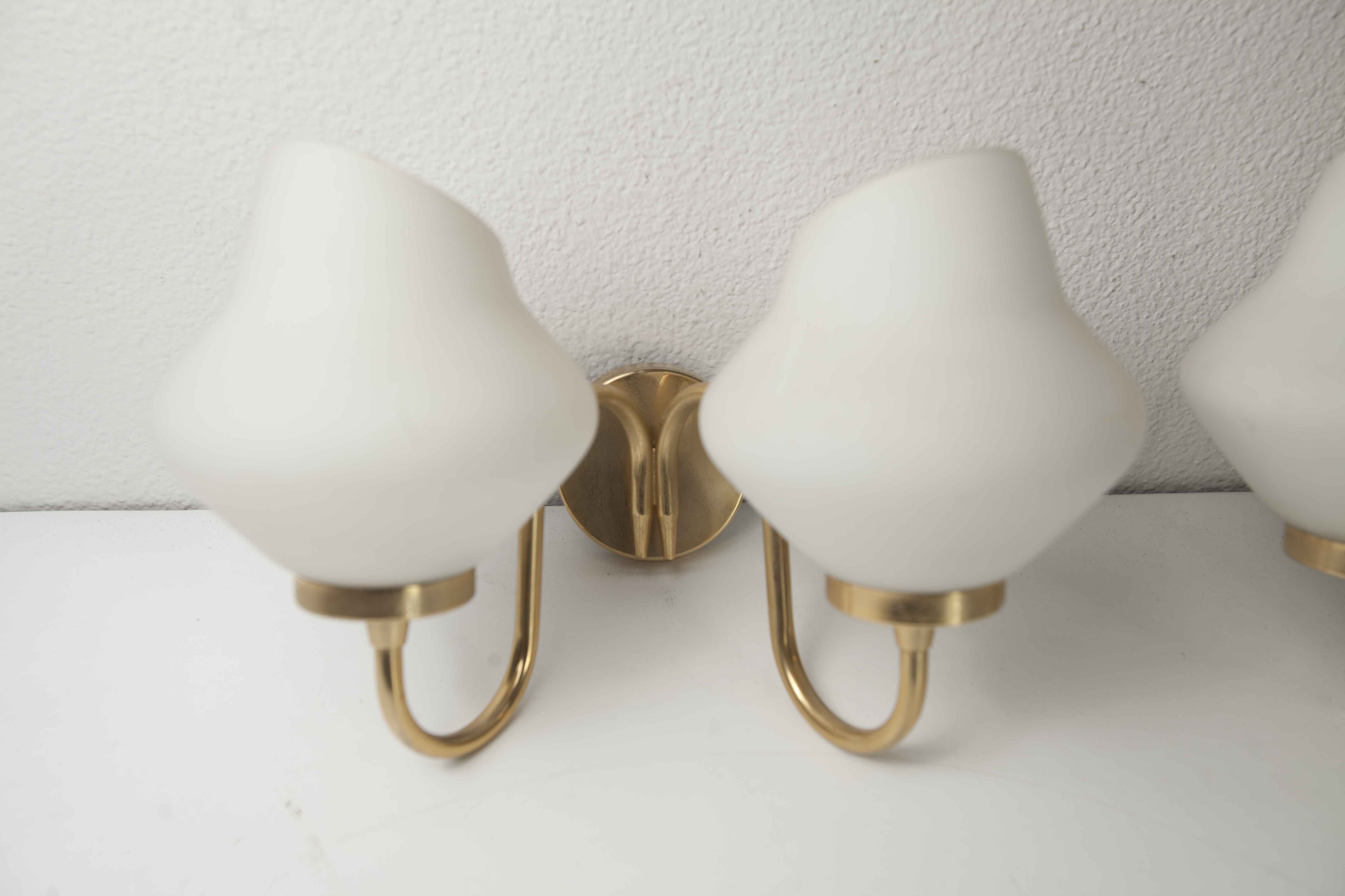 Pair of 60s brass and opaline sconces