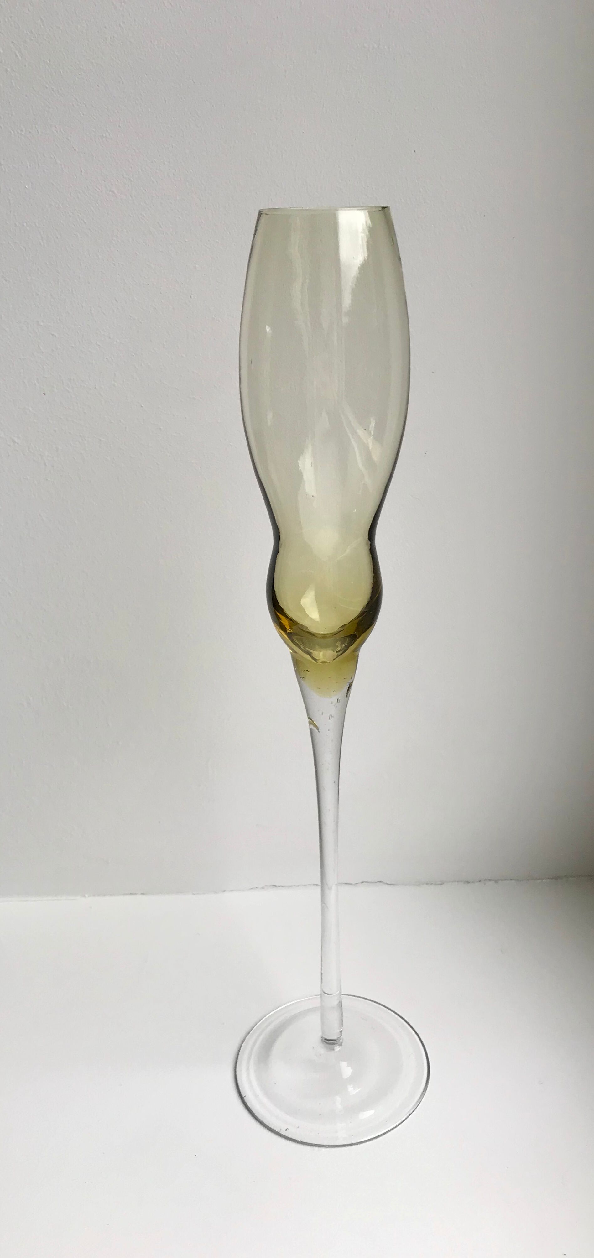 Set of 10 very high champagne flutes in colored glass 70s