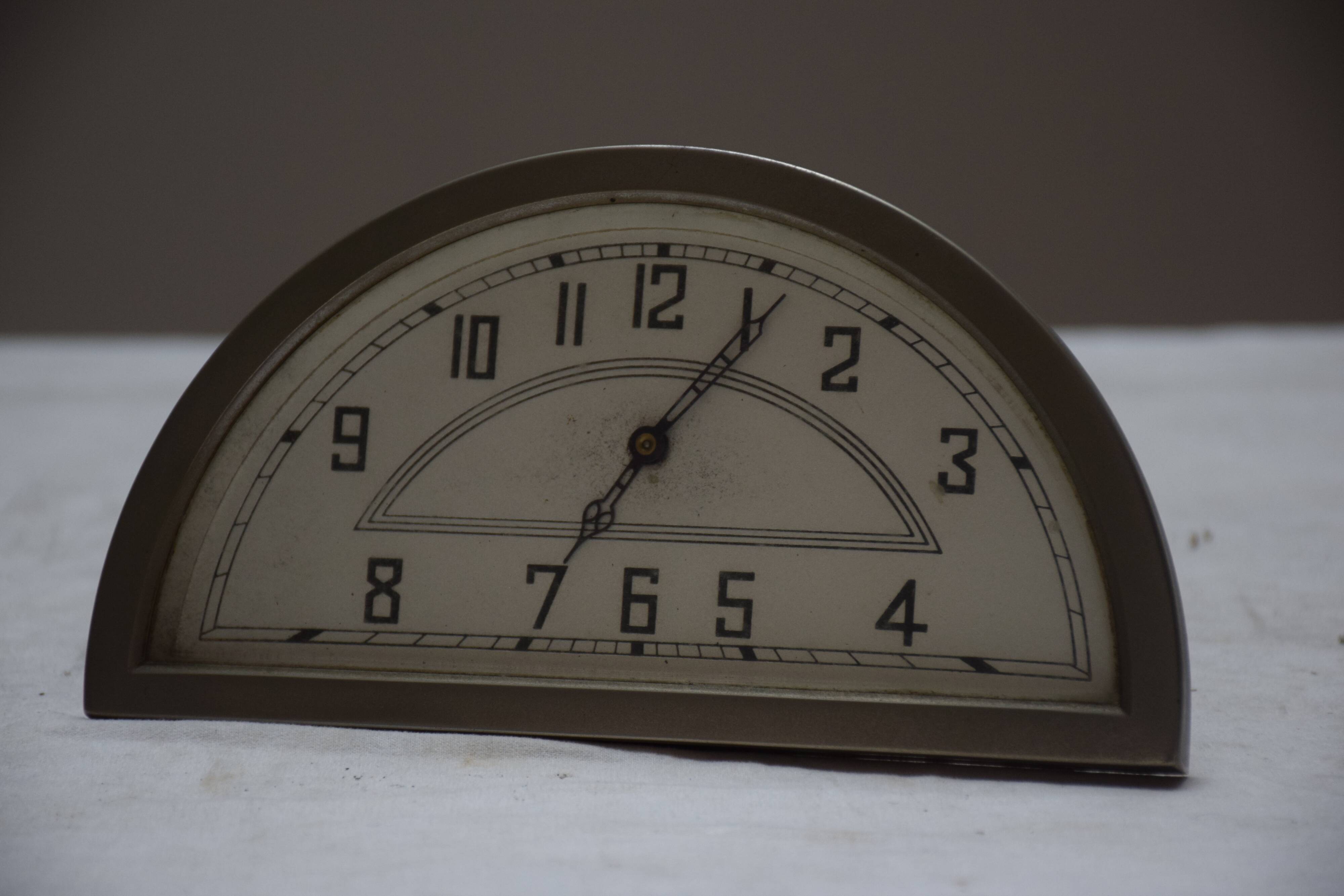 Half moon clock circa 1930