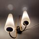 Pair of sconces in black metal and gilded brass 1960 Vintage.