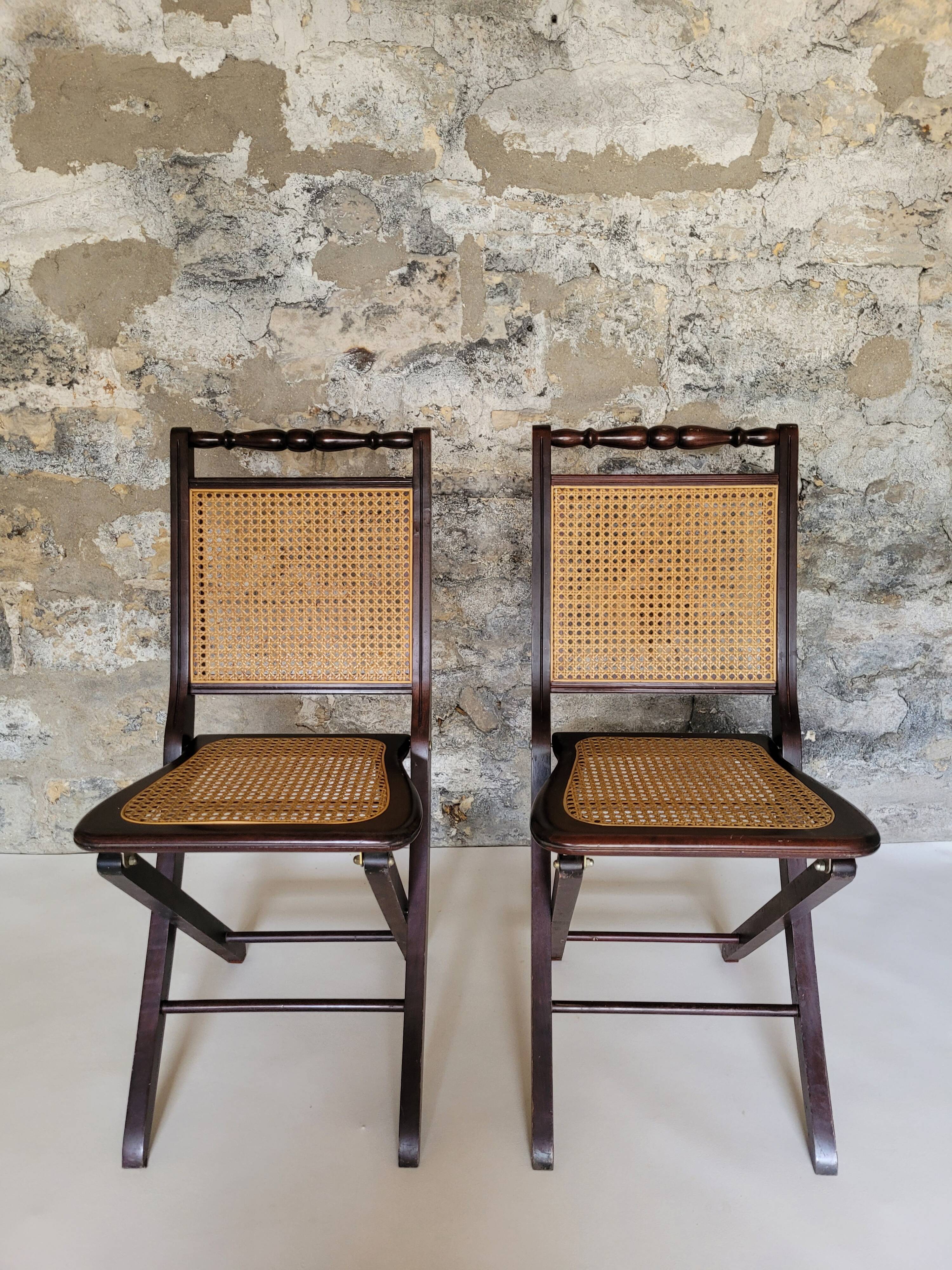 Pair of folding cane chairs