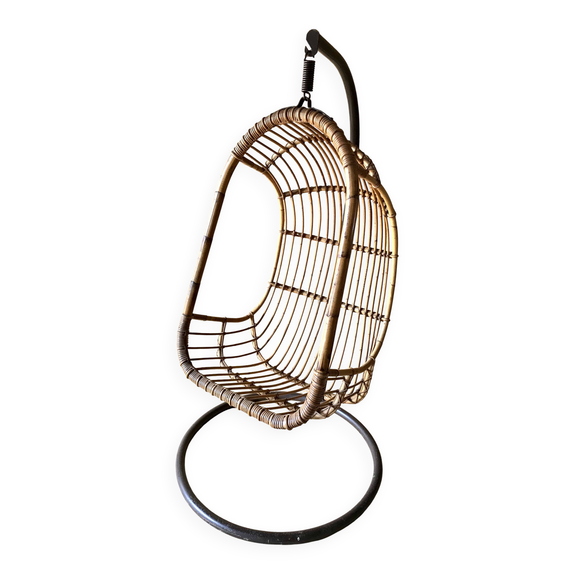 Vintage rattan hanging chair with its stand.