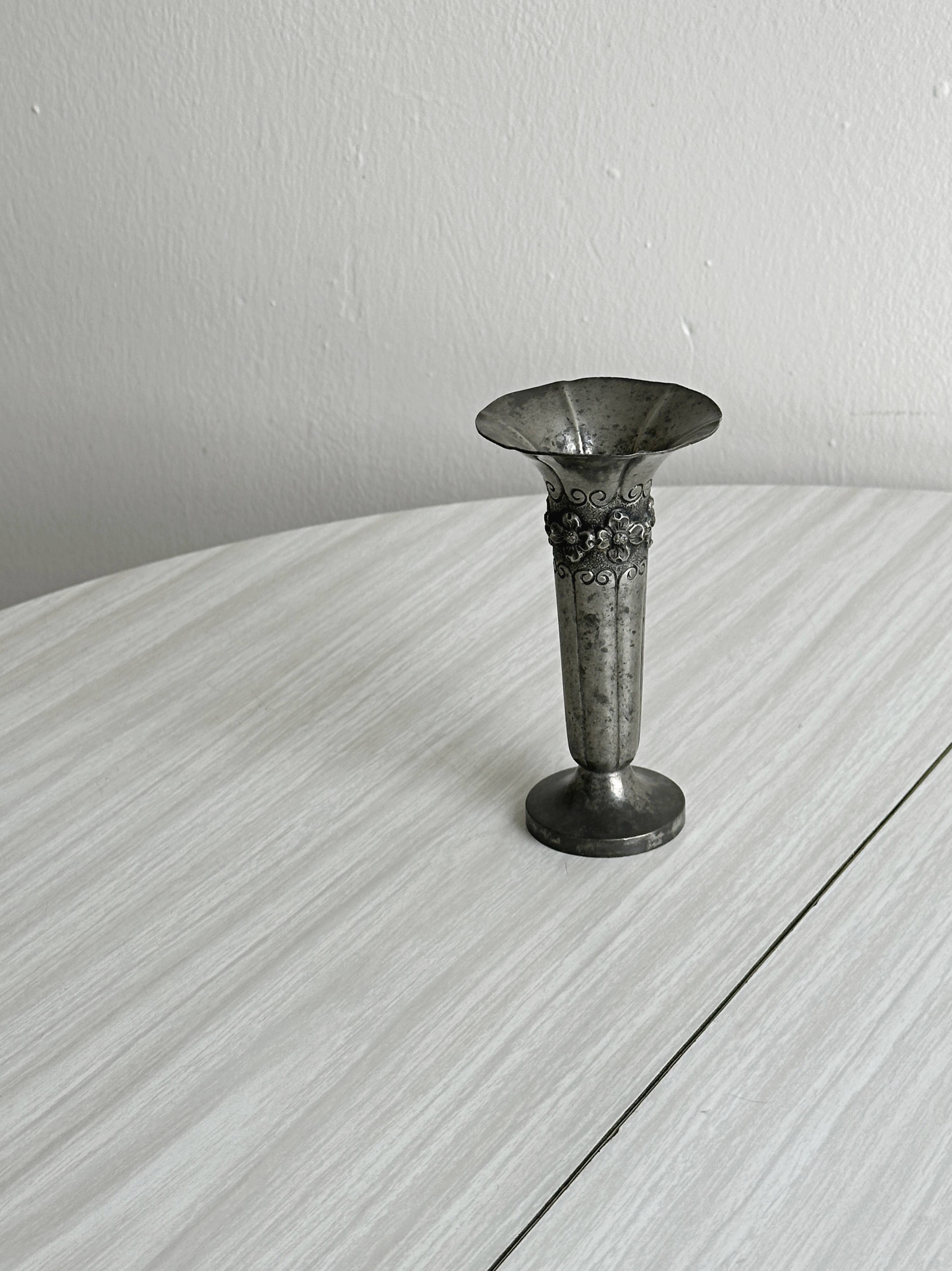 Patinated metal vase