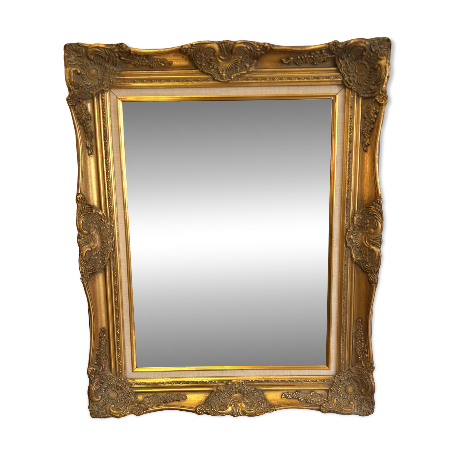 Golden wooden mirror in Louis XV style