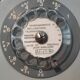 Old vintage wired dial phone with its earphone, gray color. Late 70s - early