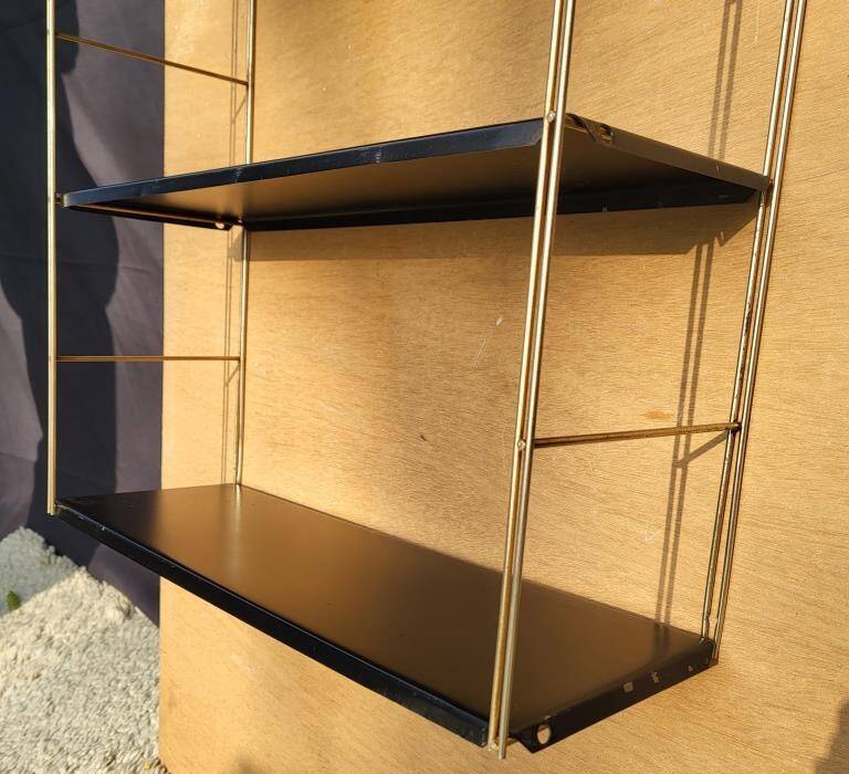 Tomado style black metal string shelf with gold ladder