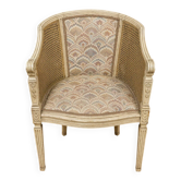 Gondola armchair in Louis XVI style, carved wood with a cream patina.