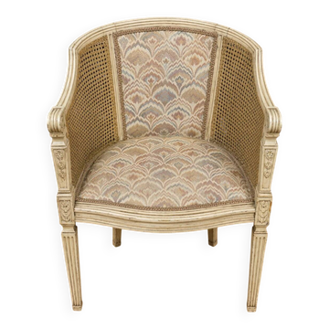 Gondola armchair in Louis XVI style, carved wood with a cream patina.
