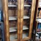 Two-door display cabinet in transitional style.