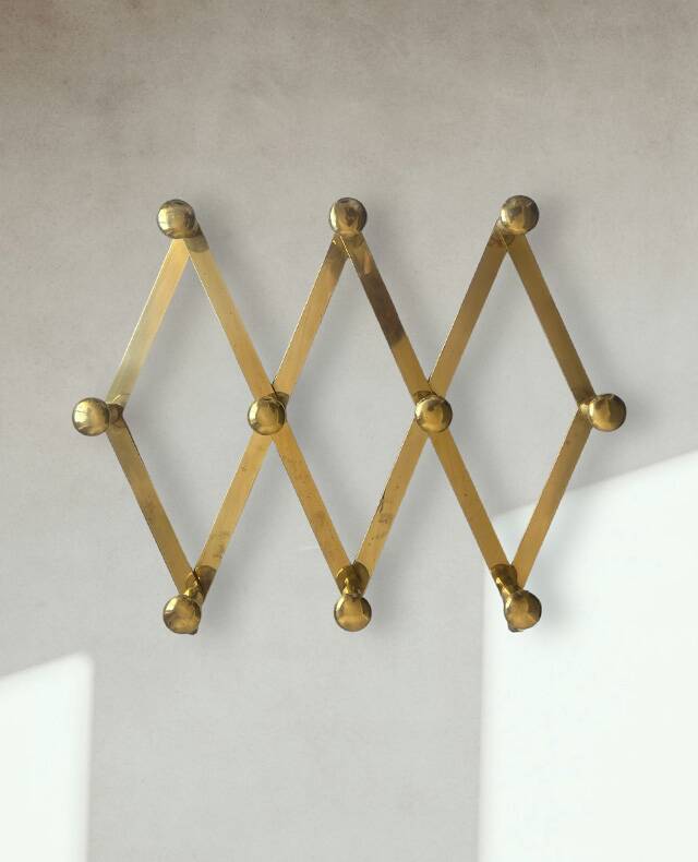 Brass accordion coat rack