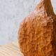 Hand-carved soliflore vase in solid cherry wood.