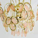 Lustre vintage suspension en métal doré et laiton feuilles en verre rose et pampilles. Année 70 80