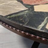 Round coffee table in wrought iron and marble