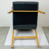 Roland Rainer Lounge Chair Café Ritter with grey bouclé.