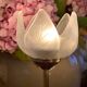 Pair of tulip-shaped candle holders in frosted glass and brass.